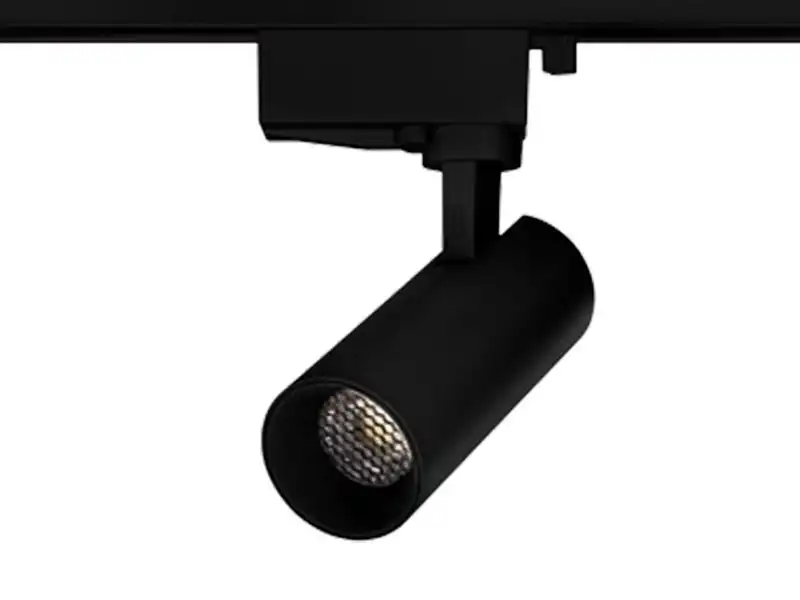 a black track light with a white background